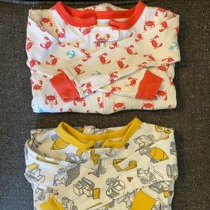Two Carter’s patterned sleepers